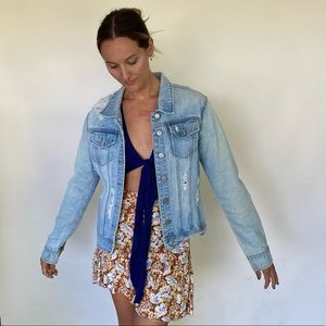 Distressed denim jacket